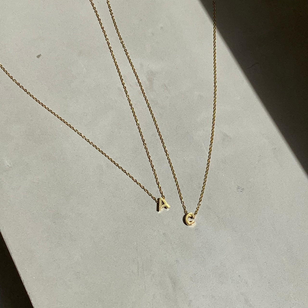 tiny initial necklace｜ANCHE（アンシェ）公式オンラインストア