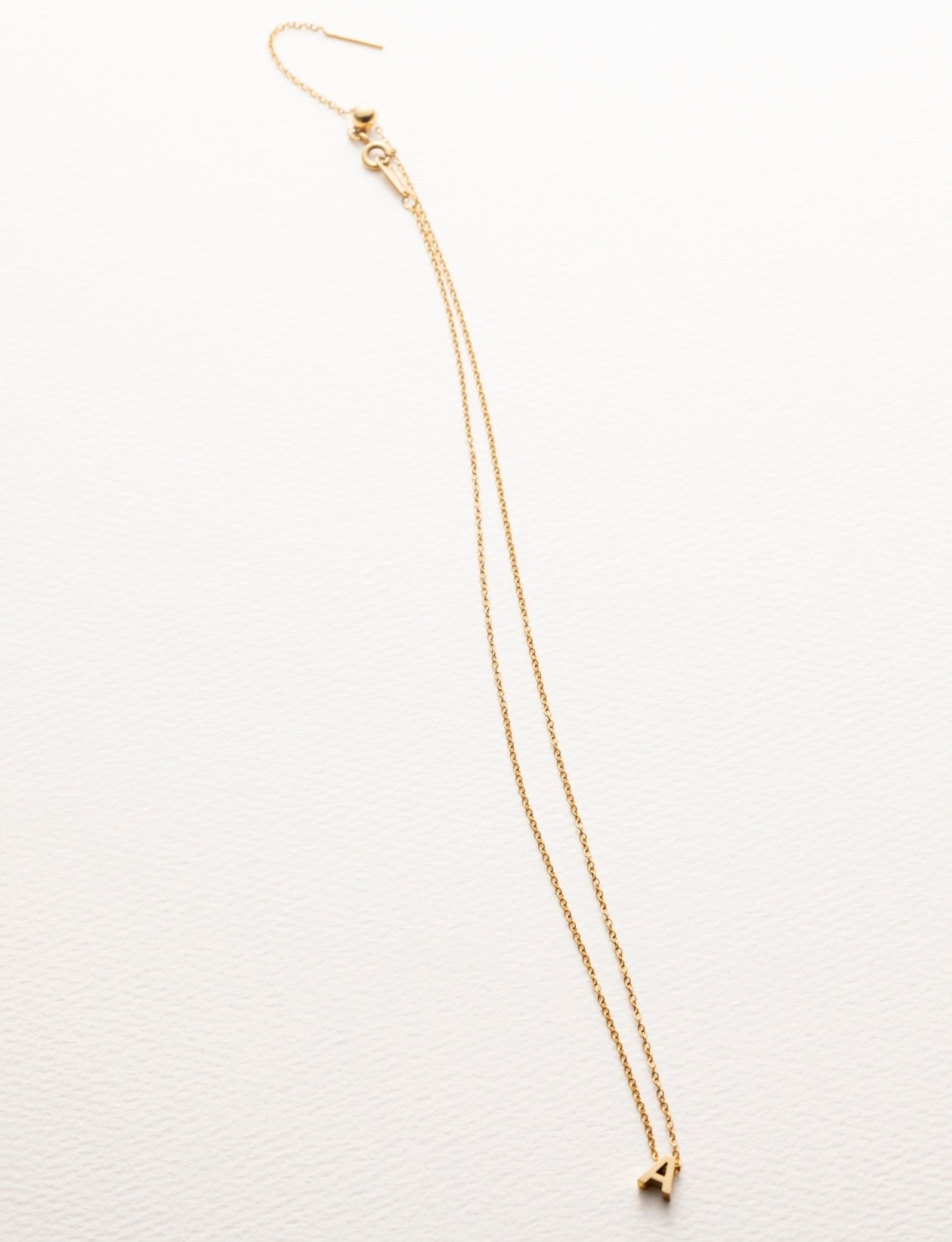 tiny initial necklace(タイニーイニシャルネックレス)